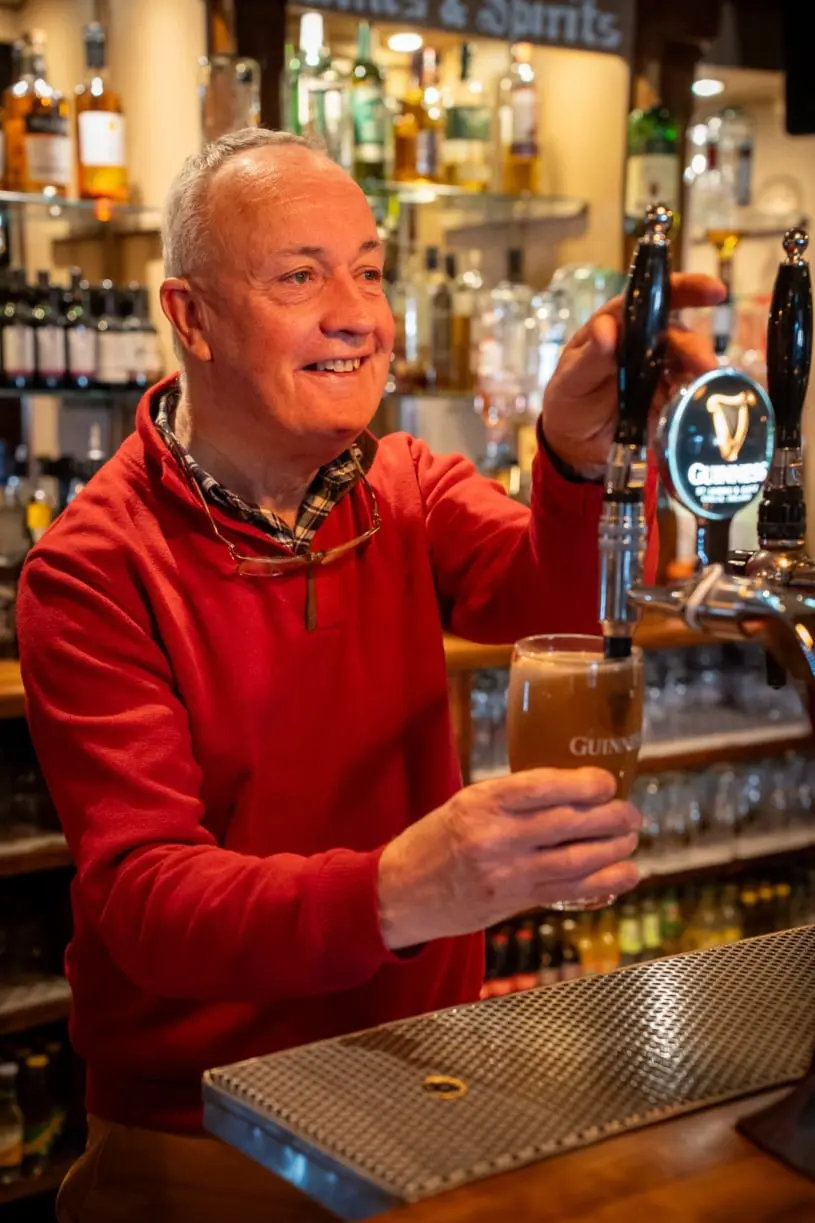 Sean pulling a pint of Guinness